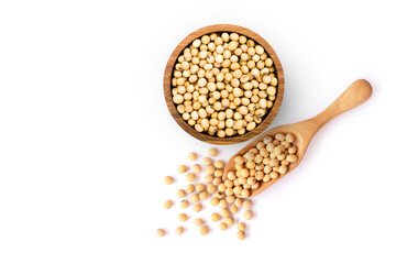 Wall Mural - Soybeans in wooden bowl and scoop isolated on white background. Top view. Flat lay.