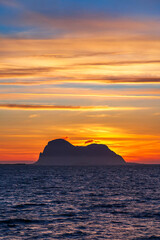 Sticker - Rock formation at sea with an amazing sunset