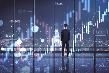 Canvas Print - Back view of business man standing in dark office interior with big data index, forex chart and city view. Double exposure.