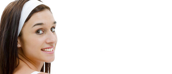 Wall Mural - portrait of smiling young brunette on white