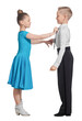 © oleghz - Sports ballroom dancing. Couple of kids, boy and girl  on isolated white background
