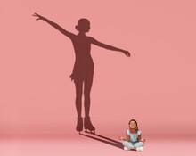 Little Happy Girl Sitting On Floor And Dreaming Of Becoming Figure Skater Isolated On Pink Background. Sport, Career And Dreams Concept. Collage