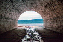 Beautiful View Of The Sea From Under An Arch Tunnel