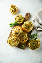 Wall Mural - Homemade puff pastry swirls with pesto sauce