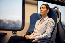 Young Pensive Woman Traveling By Train.