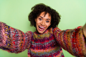 Sticker - Portrait of positive pretty girl take selfie tongue lick teeth good mood isolated on green color background