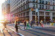 © deberarr - Colorful crowds of people walking through the busy intersection on 23rd Street and 5th Avenue in New York City
