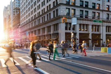 Wall Mural - Colorful crowds of people walking through the busy intersection on 23rd Street and 5th Avenue in New York City