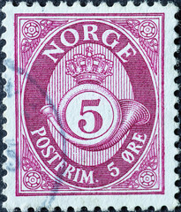 Wall Mural - Norway - circa 1962: a postage stamp from Norway , showing a post horn with crown and numeral 5 purple