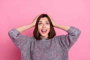 Sticker - Portrait of attractive cheerful amazed girl looking up copy space sale isolated over pink pastel color background