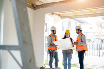 Fototapete - Engineers and architect discussion for plans for new home and working on a building site,Architecture concept.