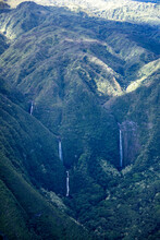Waterfalls On Molokai. The Largest Sea Cliffs In The World. 