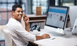 © Neil Bedeker/peopleimages.com - Taking care of your inquiries with speed. Portrait of a young businessman working on a computer in a call centre.