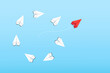 © Olga Tsikarishvili - Problem and solution concept, group of white paper planes fly in a circle and one red paper plane pointing in different way on blue background. Business new ideas creativity, solve the difficulties.