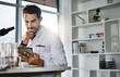 © Delmaine Donson/peopleimages.com - I need to think this one through a bit more. Shot of a scientist using a digital tablet while working in a lab.