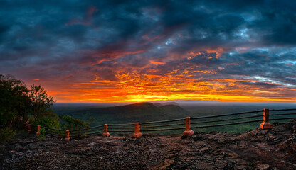 Wall Mural - panorama vivid colorful clouds sunrise above mountain.beautiful morning sunshine landscape at pha mo