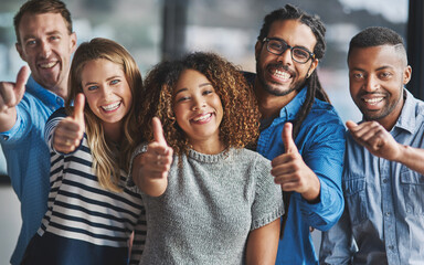 Sticker - Were on the job. Portrait of a group of creative businesspeople giving thumbs up while standing in their office.