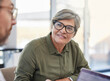 © Lumeez Ismail/peopleimages.com - I love your energy. Shot of a mature businesswoman having a meeting with her colleague.