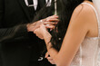 © ksyusha_yanovich - The bride and groom exchange wedding rings, close-up
