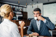 © Dusan Petkovic - Couple having coffee and dessert in a coffee shop.