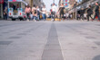© hakule - Crowd of anonymous people walking on busy city street
