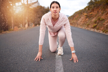 Poster - Youll be surprised at the limits your body can reach. Shot of a young woman in starting position while exercising outdoors.