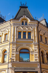 Moscow, Russia, April 6, 2022. Typical historical architectural in downtown, Kuznetsky most street, facade fragment