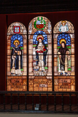 Sticker - Vertical shot of a religious glass window inside Santo Domingo convent in downtown Lima, Peru