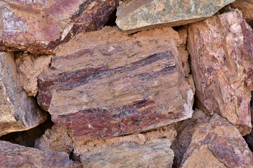 Poster - A blockade of large red rocks