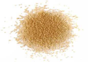 Wall Mural - Brown crystal cane sugar pile isolated on white, top view