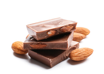 Wall Mural - Pieces of tasty chocolate with almonds on white background