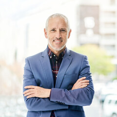 Poster - The look of a successful executive. Portrait of a mature businessman standing in a modern office.