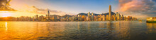 Sunrise Over Hong Kong Island And The Highrise Buildings As Seen From Across The Harbor At Tsim Sha Tsui On The Kowloon Side. 