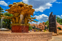 Entrance Of The Palace / Lost City /Sun City With Stone Statues Under Blue And Cloudy Sky