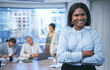 © Azee J/peopleimages.com - Stay focused and keep it moving. Shot of a beautiful businesswoman standing in a boardroom during a meeting.