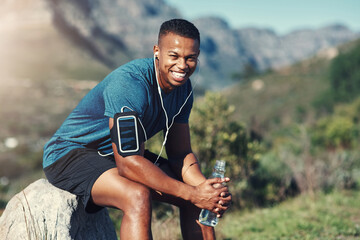 Sticker - Resting for now before I get back to fitness. Cropped shot of handsome young male runner taking a break and drinking water outdoors.