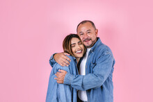 Latin Father And Daughter In Casual Clothes In A Copy Space On Pink Background In Mexico Latin America	
