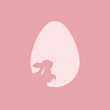 Jajko wielkanocne i mały królik na różowym tle. Symbole świąt. Prosta ilustracja w minimalistycznym stylu na kartki świąteczne, zaproszenia, banery, plakat.
