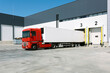 © VICTOR TORRES/Stocksy - Truck parked in factory warehouse
