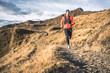 © plpictures by Paedii Luchs/Stocksy - Smiling trail running girl in the alps.