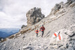 © plpictures by Paedii Luchs/Stocksy - Endurance athletes in alpine terrain.