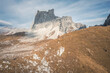 © plpictures by Paedii Luchs/Stocksy - Two small trail runners in a vast alpine landscape.