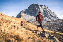 Trail Runners In The Alps.