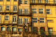 © Valentina Barreto/Stocksy - Facade antique buildings view in Oporto