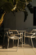 © Malquerida Studio/Stocksy - terrace table and chairs