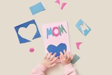 Little Kid Making Papercraft Greeting Card For Mom