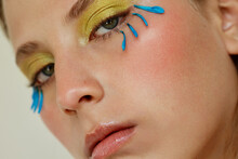 Close-up Of A Young Woman With Creative Makeup