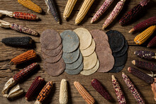 A Circle Of Corns Of Different Colors With Tortillas 