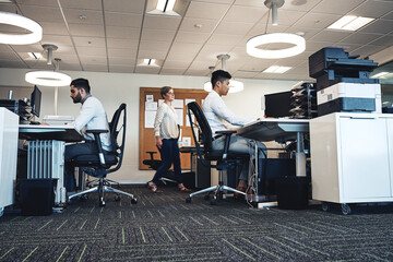 Aufkleber - Working hard to get the job done. Shot of businesspeople working in the office.