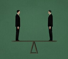 Two Businessmen Standing On A Seesaw Illustration